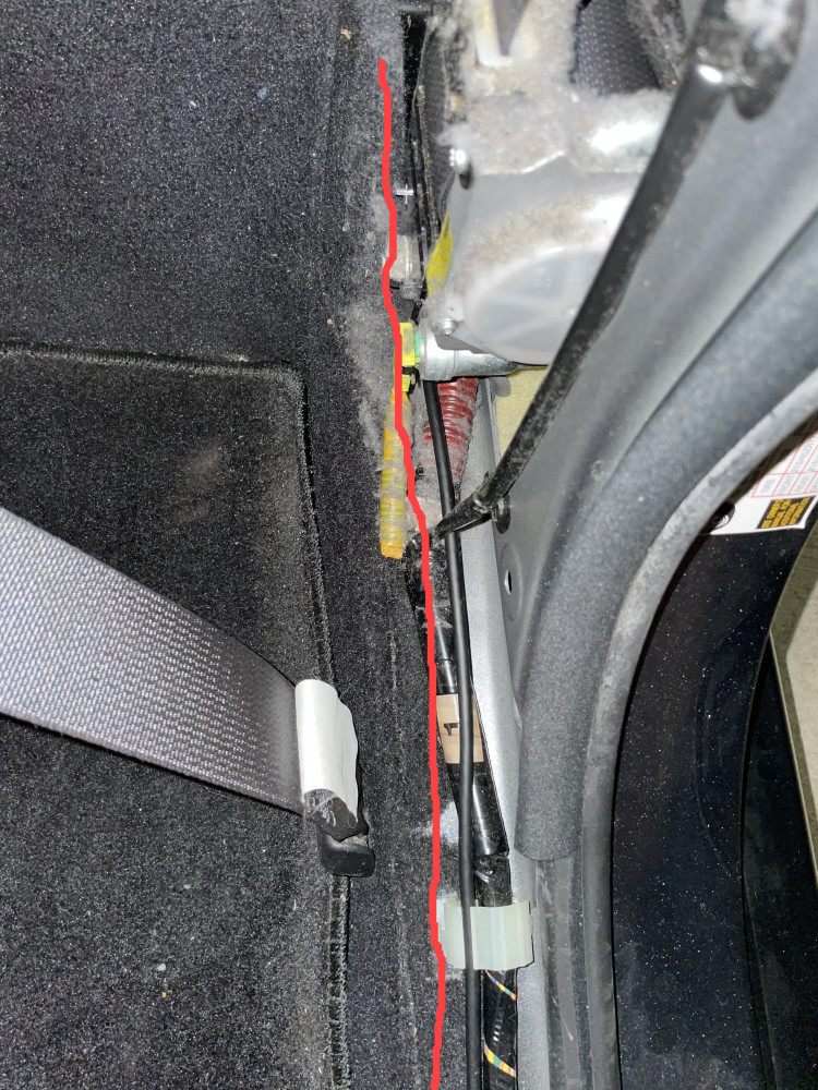 Rear dash cam cable routing along the rear-driver's-side-passenger-area.