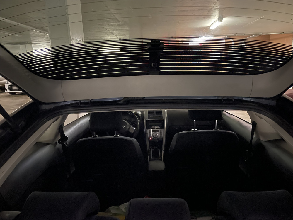 Rear dash cam installed with hatchback door trim replaced